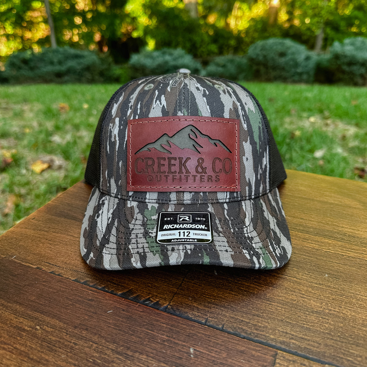 Outfitters Mountain Custom Leather Patch Trucker Hat – Creek & Company
