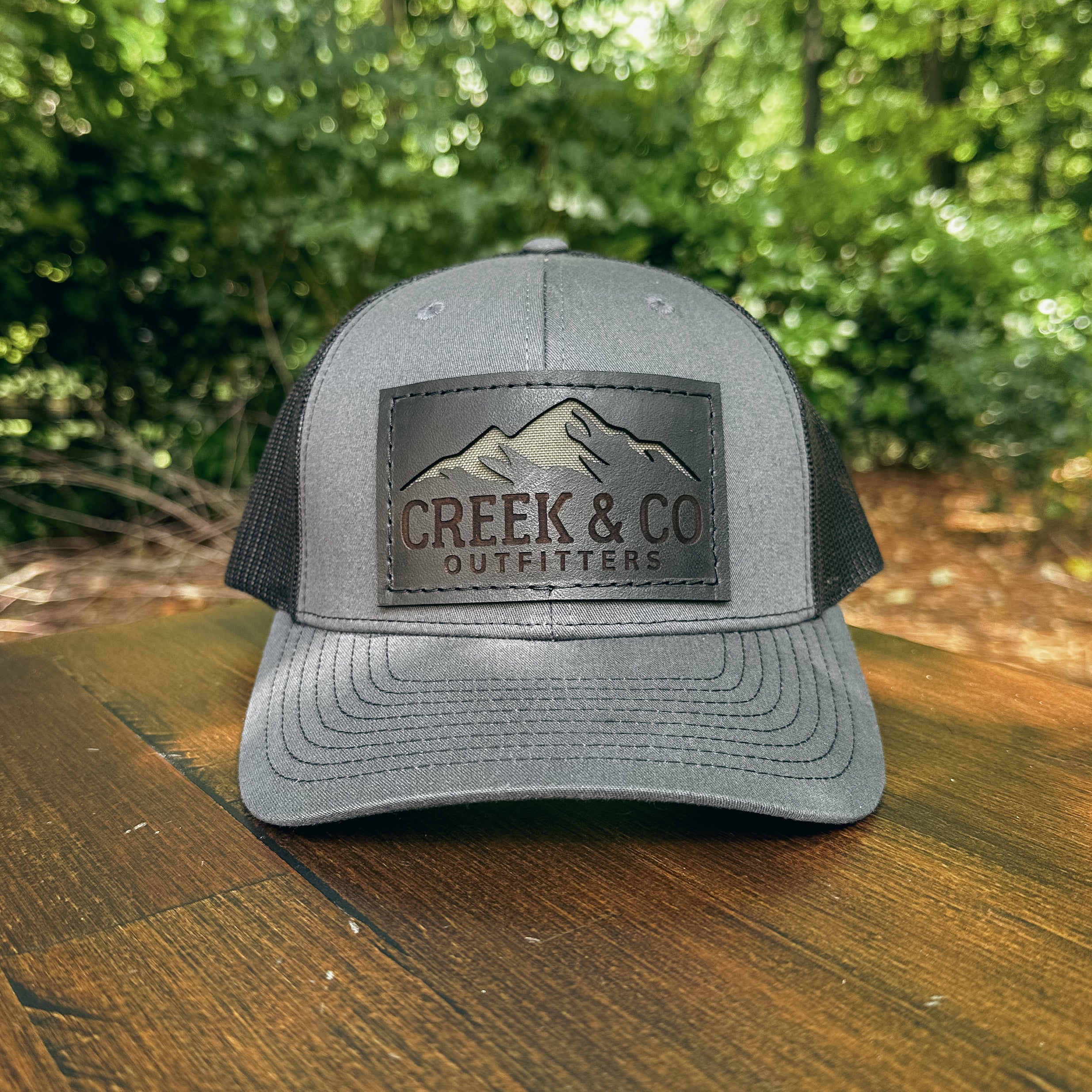 Outfitters Mountain Custom Leather Patch Trucker Hat – Creek & Company