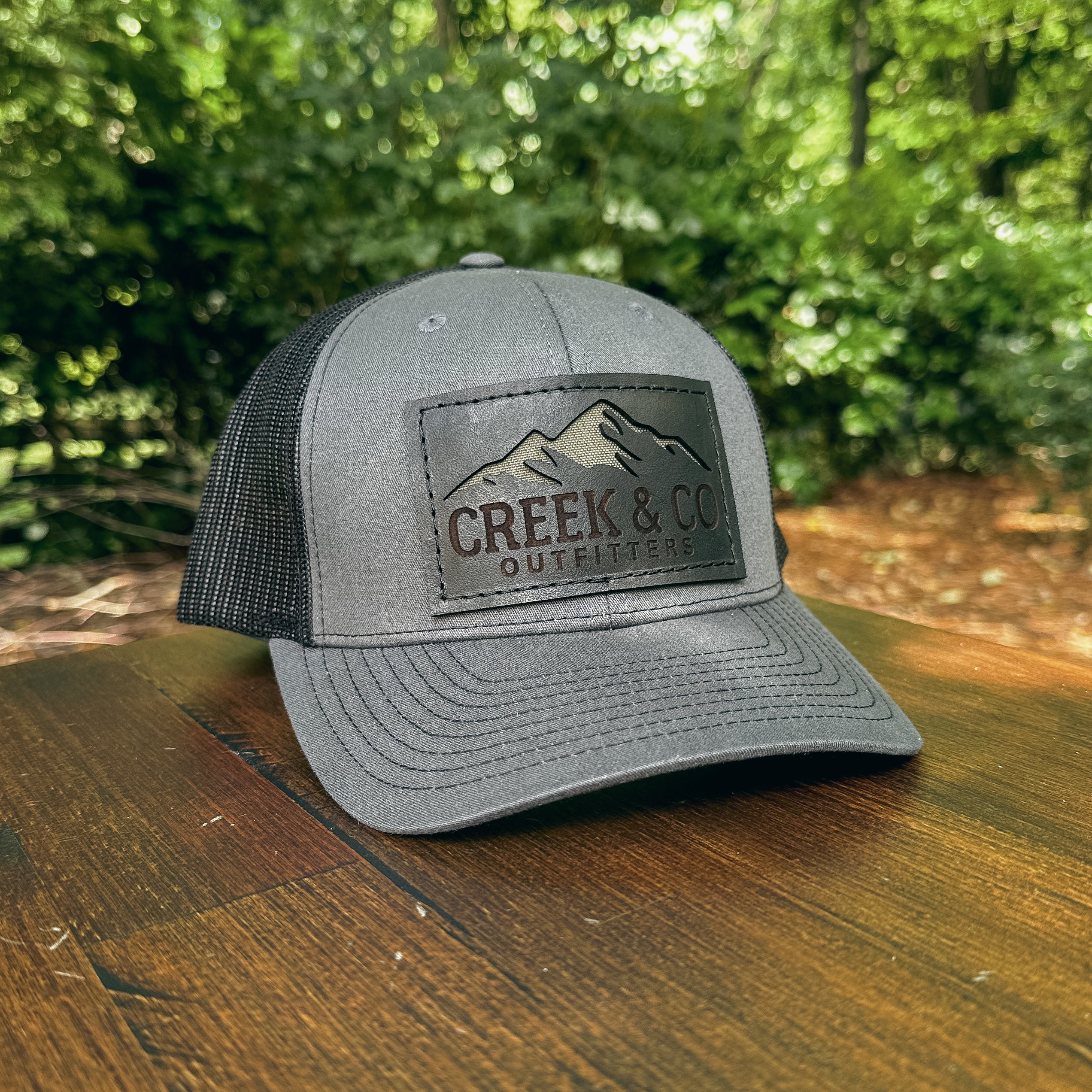 Outfitters Mountain Custom Leather Patch Trucker Hat – Creek & Company
