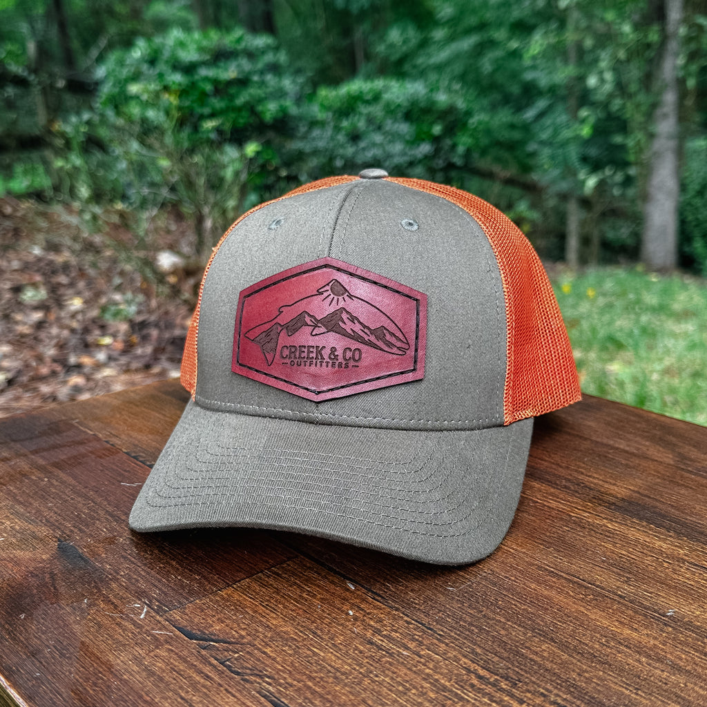 Outfitters Mountain Trout Custom Leather Patch Trucker Hat – Creek & Company