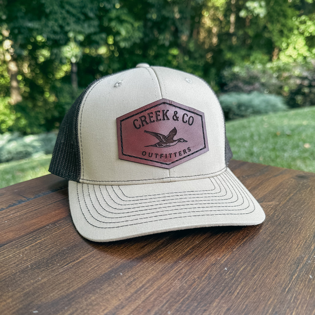 Outfitters Pintail Custom Leather Patch Trucker Hat – Creek & Company