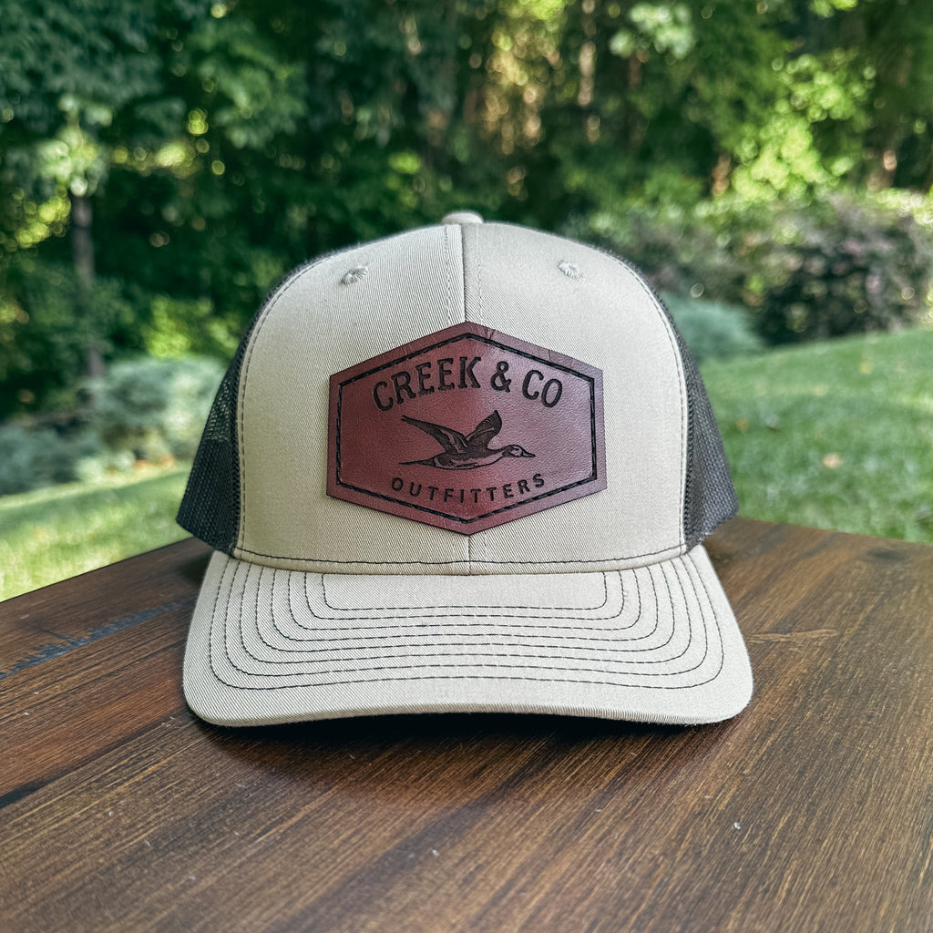 Outfitters Pintail Custom Leather Patch Trucker Hat – Creek & Company