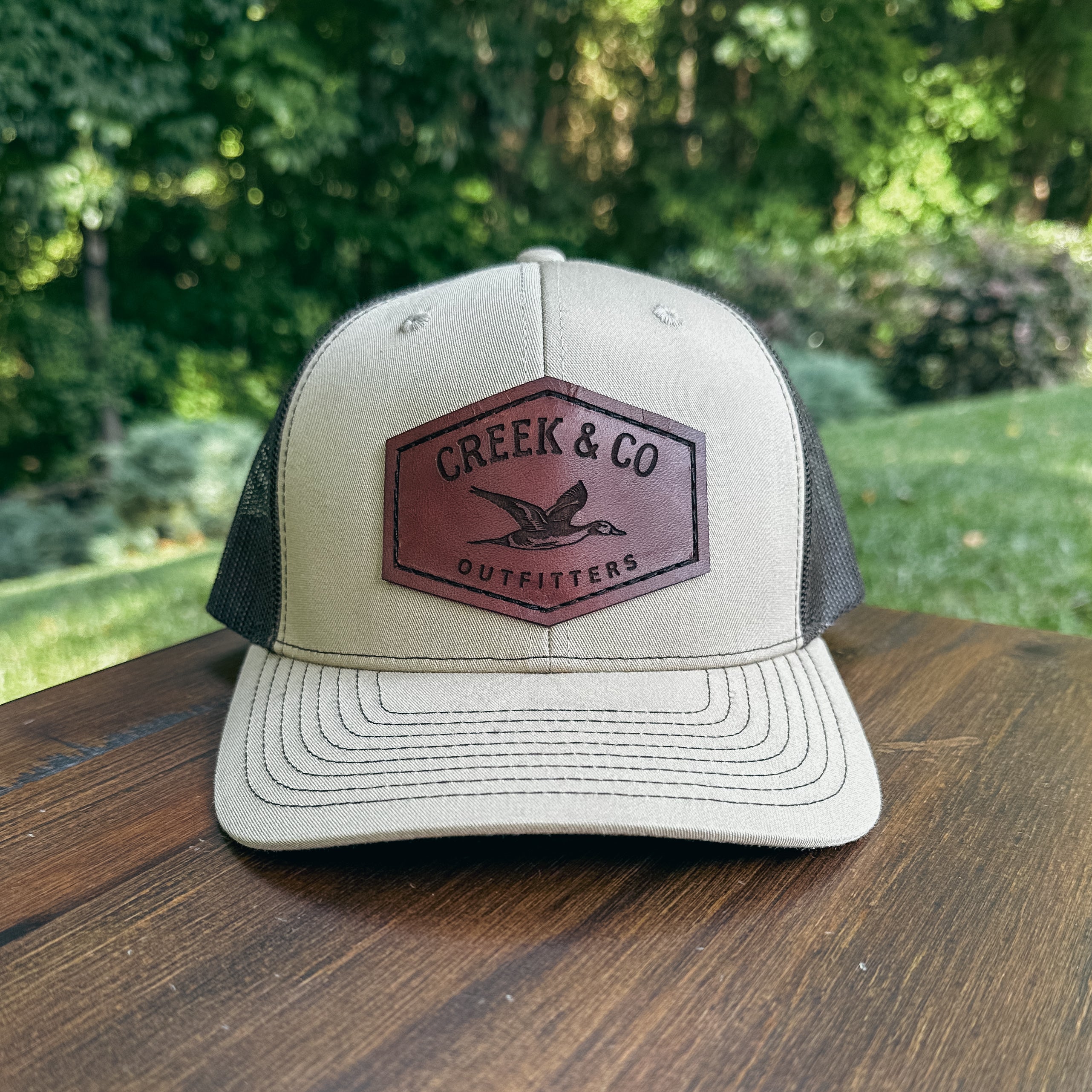 Outfitters Pintail Custom Leather Patch Trucker Hat – Creek & Company
