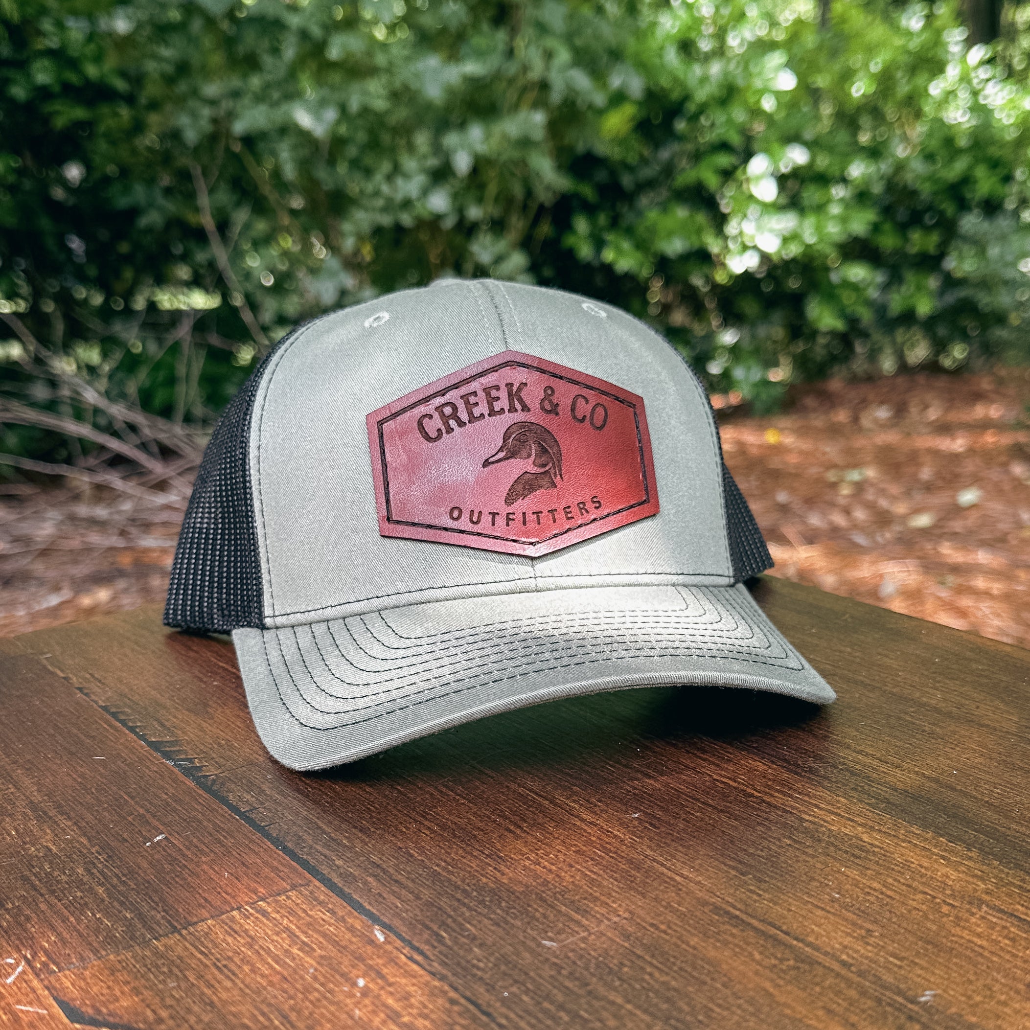 Outfitters Woodland Duck Custom Leather Patch Trucker Hat – Creek & Company